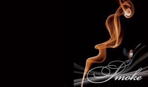 Little brown bird with black wings flies next to the neon fire-orange smoke