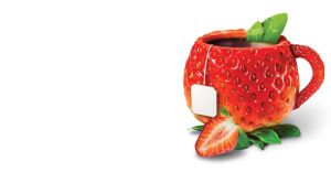 Black tea is brewed in a red strawberry cup with green leaves