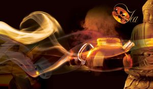 Teapot with tea and buddha statue