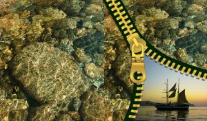 Underwater olive pebbles rocks with a sailing ship