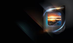 Orange sunset on a rocky shore in a radiant metallic frame on a black texture