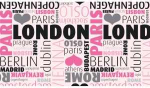 Black and pink EU capitals seamless pattern printed on a pastel pink backdrop