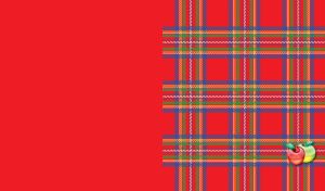 Classic plaid texture of different color lines on red with two apples bottom right