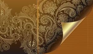 Golden batik pattern on a brown page with a curved corner