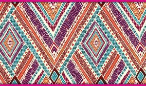 Ethnic ornate tribal boho aztec pattern with geometric design on beige