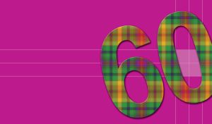 Green, blue and yellow patterned number sixty on a purple page