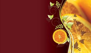 Orange slices close up with light green grapes and single orange slice on maroon