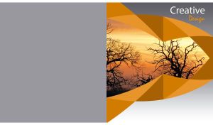 Bare trees at sunset in a creative ocher art frame against a grey background