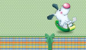 A happy white doggie with dark ears on a green sled