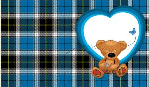 Teddy bear with a flower against a big heart on blue and black plaid backdrop