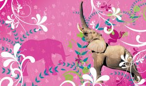 A grey elephant with his trunk held high in a floral patterns