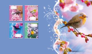 European robin on a flowering tree on light navy backdrop with floral decor