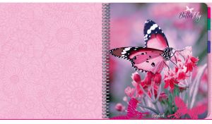 Monarch butterfly and flowers on a blush pink cover of a spiral notebook
