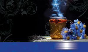 Glass mug of hot rosehip tea and a bouquet of blue asters under a spotlight