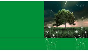 A lonely tree in a green field struck by a lightning against a green backdrop