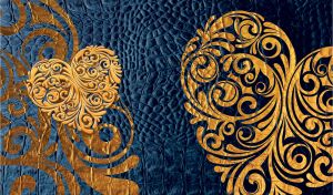 Golden swirl heart stencil on navy-blue leather texture