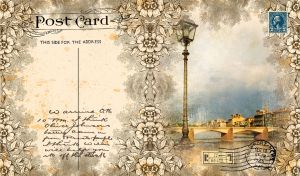 An old lamppost by the bridge framed with a floral stencil on a vintage postcard