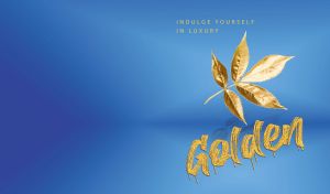 Golden ash leaves on a deep blue backdrop