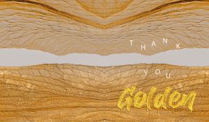 Aged gilded wood close-up on a beige backdrop