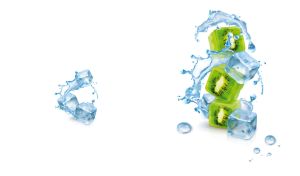 Cubes of ice and kiwis with water splashes on a white backdrop