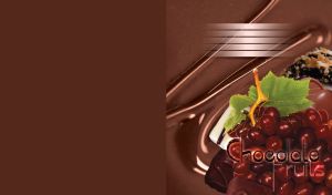 Grapes and chocolate candies on melted milk chocolate