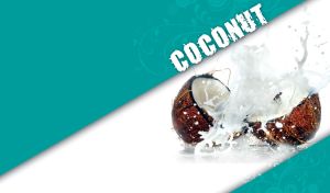 Coconut cut in half in the splashes of coconut milk