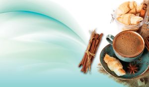 Cup of black coffee by a jar of croissant and cinnamon sticks on pastel teal