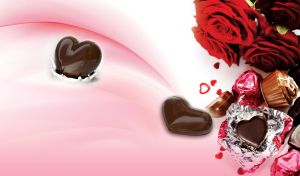 Bouquet of red roses and chocolate candies on pastel pink