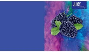 Fresh blackberries against a purple-blue art explosion on a blue backdrop