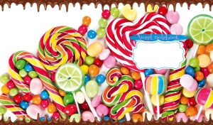 Close-up of rainbow lollipops and colorful dragee candies on a white background