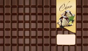 Vanilla ice cream balls against a dark brown chocolate bar backdrop