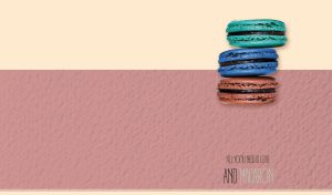 Set of macaroons on beige and textured pastel pink dual backdrop