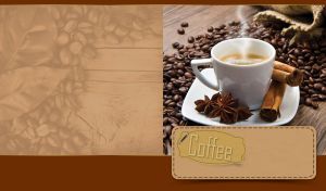 A cup of coffee with anise and cinnamon on a saucer and coffee beans on a table