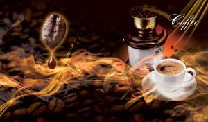 White cup of coffee next to a grinder, with waves of coffee aroma