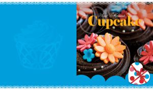 Chocolate cupcakes with floral decor on a blue background