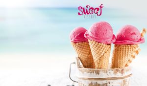 Pink ice cream in cones against a pastel blue ocean