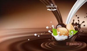 Fresh hazelnuts in splashes of milk and chocolate on a brown backdrop