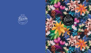 Vibrant tropical floral patterns cover half the space of a navy blue backdrop