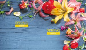 Floral arrangement with lilies and roses rustic blue wooden planks