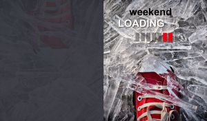 A red classic sneaker steps on icicles on a dark grey background