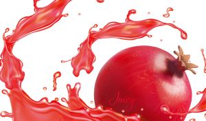 Red juicy splashes and a pomegranate on a white background