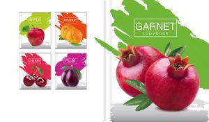 Fresh pomegranates close-up on a white backdrop with green brushstroke pattern