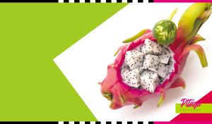 Diced pitaya served in the rind on white, lime green and fuchsia backdrop