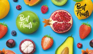 Assorted colorful fruits flat lay composition on a light blue backdrop