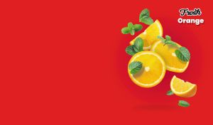 Sliced fresh oranges fruits and green mint leaves on bright red