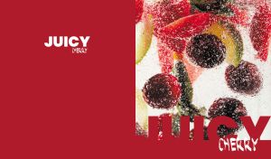 Cherries with fruits floating in sparkling water on dark red