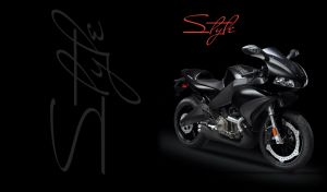Stylish matte black superbike with silver rims on black