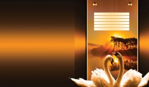 Swan pair on a gold textured plate with tall trees at a lake on orange black