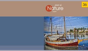 Old sailing vessel moored in the sea bay on blue and beige backdrop