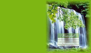 Majestic waterfall flows into the river surrounded by green branches of the trees